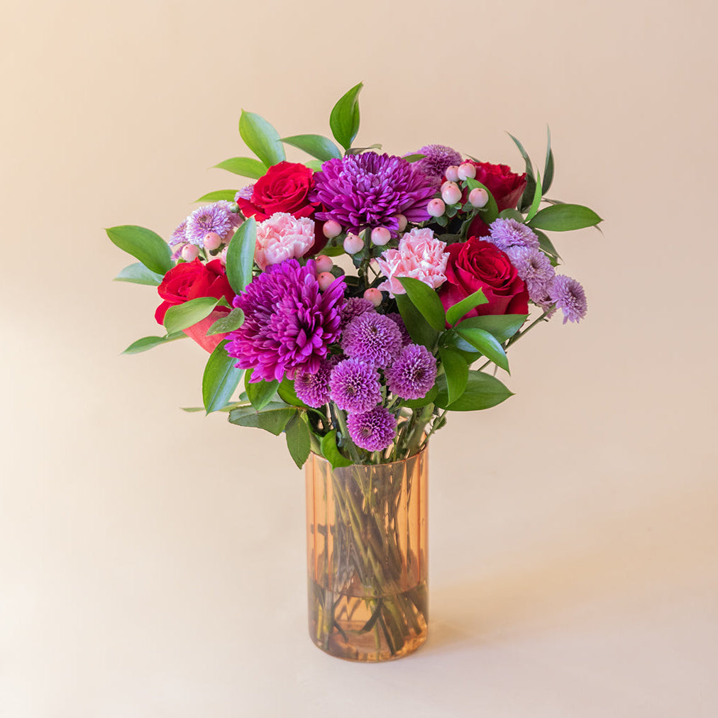 The Enchantment – red and purple flower bouquet by Aurelia Flowers