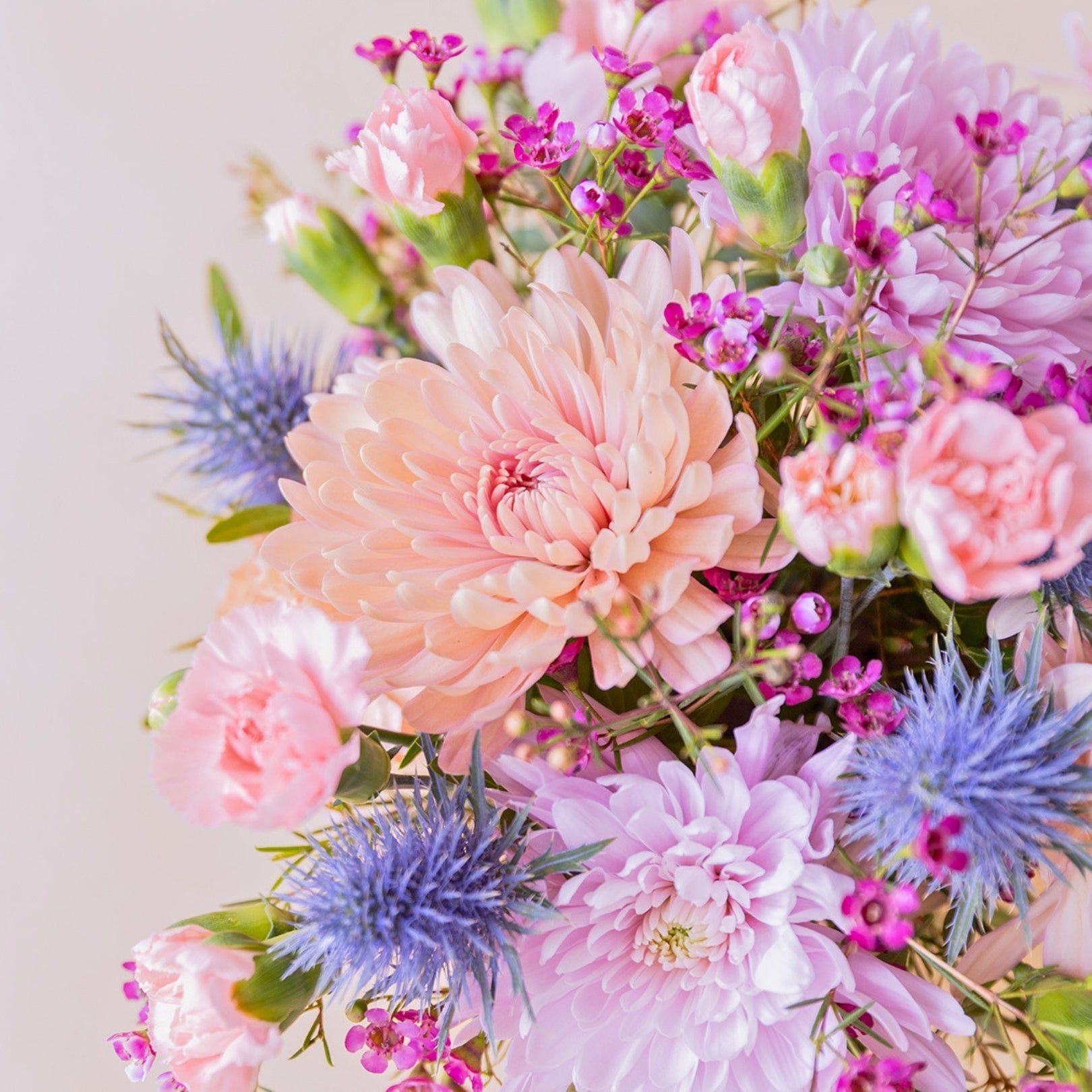 The Wink – Purple and Blue Flower Arrangement
