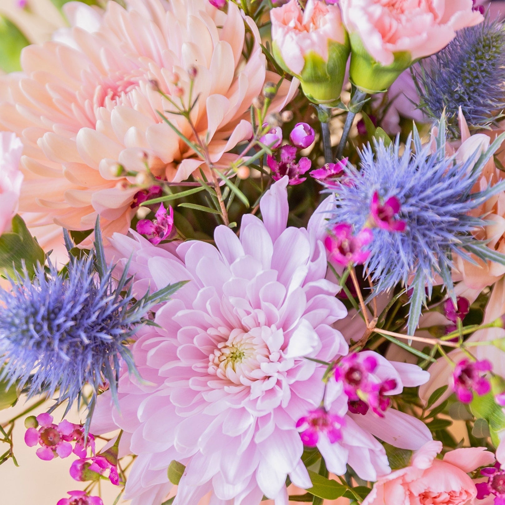 The Wink – Purple and Blue Flower Arrangement