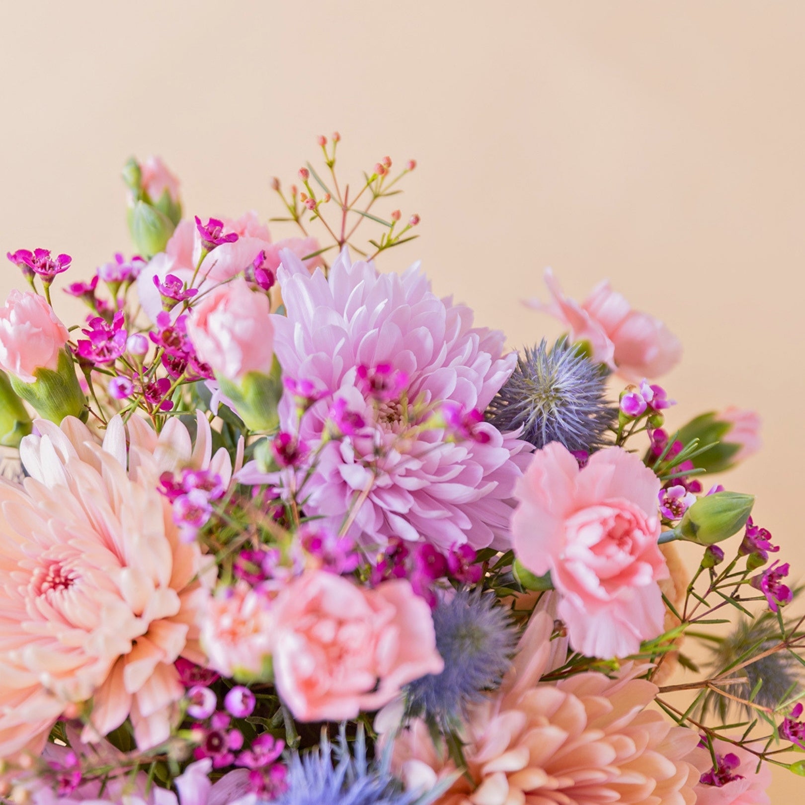 The Wink – Purple and Blue Flower Arrangement