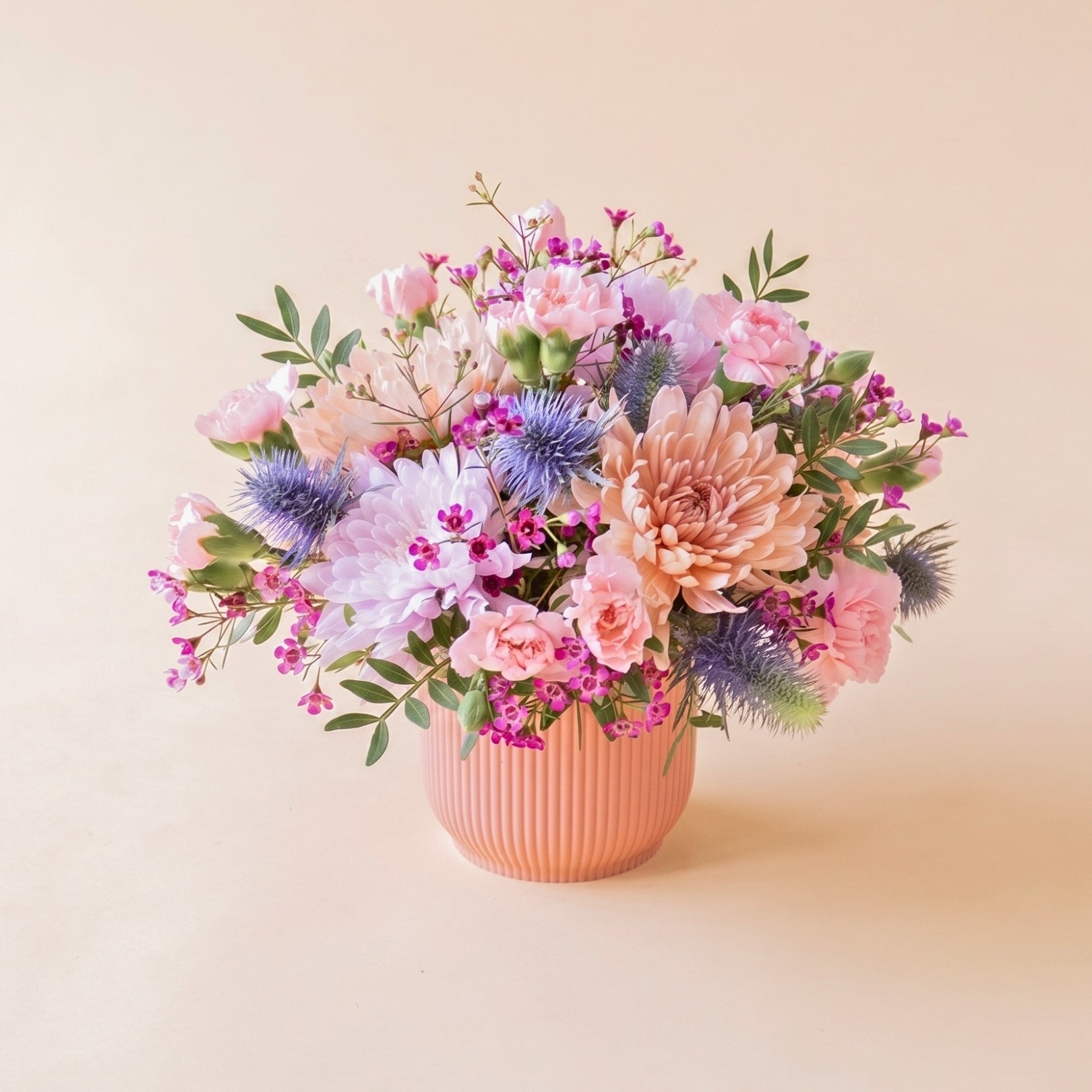 The Wink – Purple and Blue Flower Arrangement